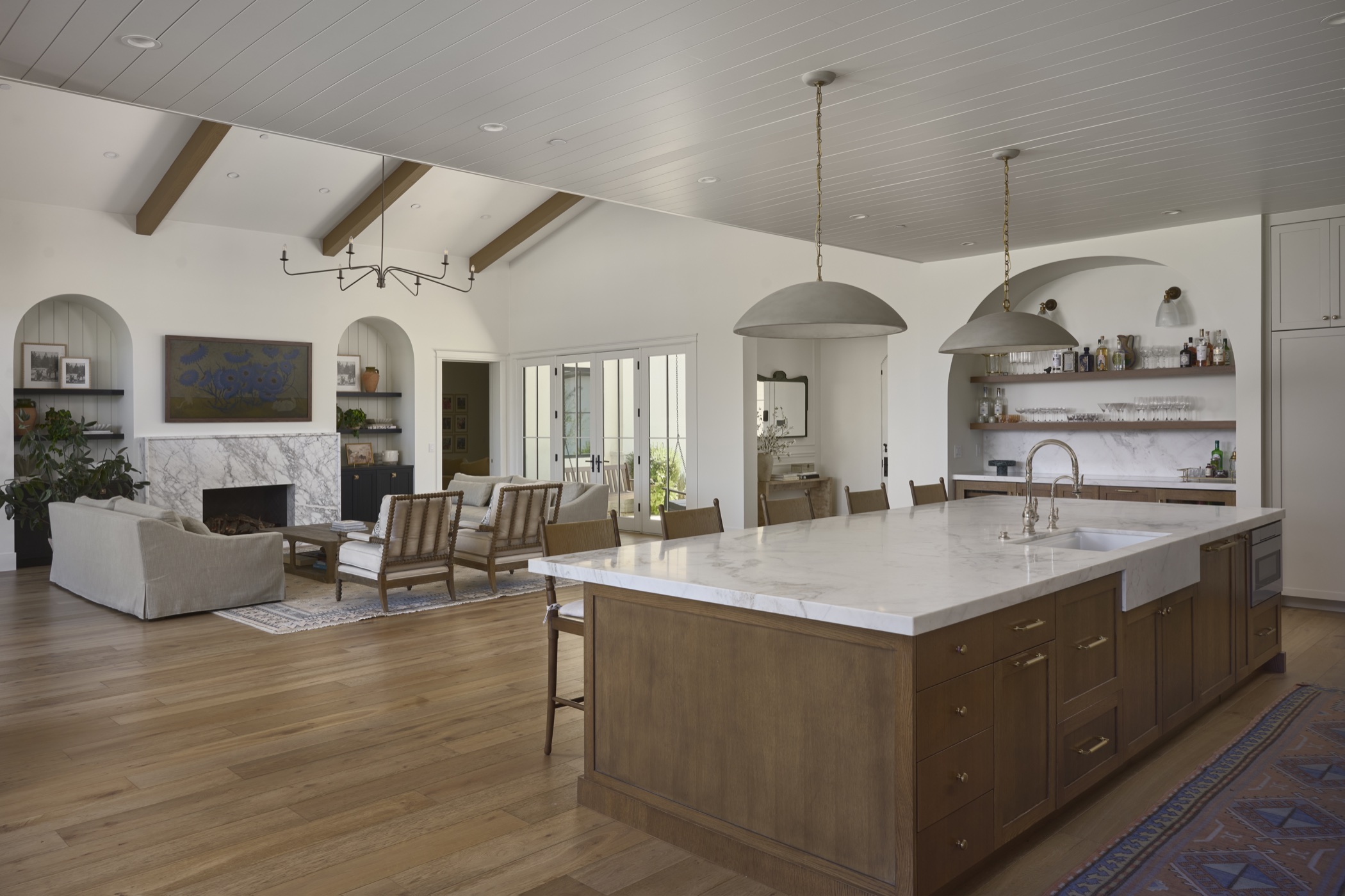 Open-plan kitchen with oak cabinetry at 53rd Place